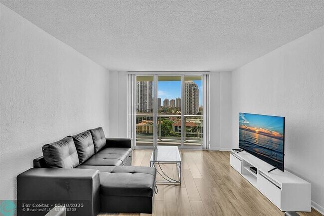 Building Photo - 19390 Collins Ave