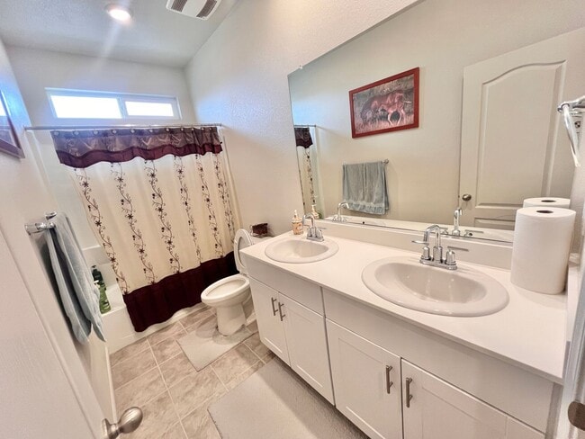 Building Photo - Reduced!! Stunning 5-bedroom, 3-bathroom home with Solar!