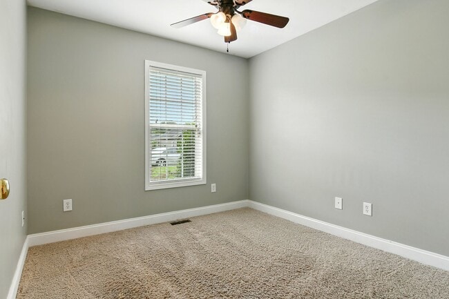 Building Photo - Charming 3BR Brick Home with Private Yard ...