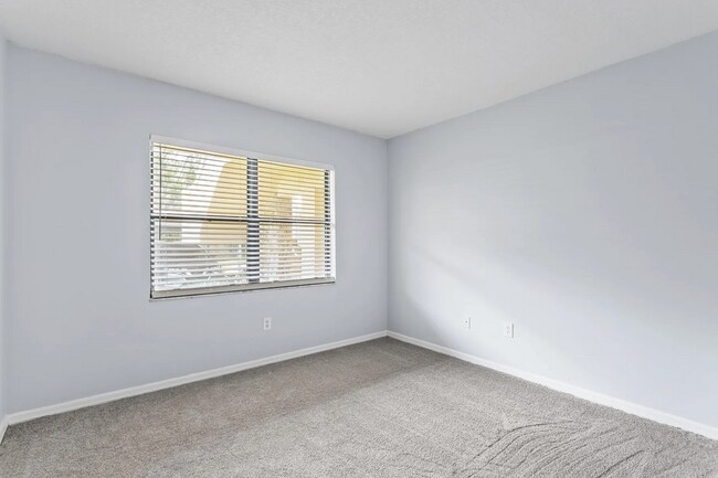 Building Photo - 2 Bed 2 Bath Condo for Rent in 55+ Peaceful Community!