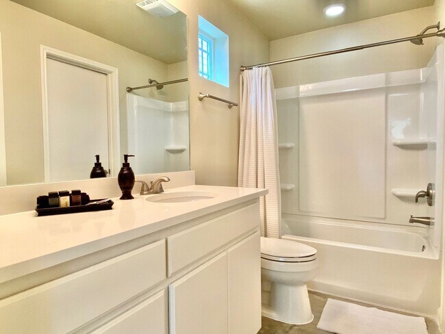 Building Photo - This charming two-story home, built in 2018, offers a spacious open floor plan perfect for casual...