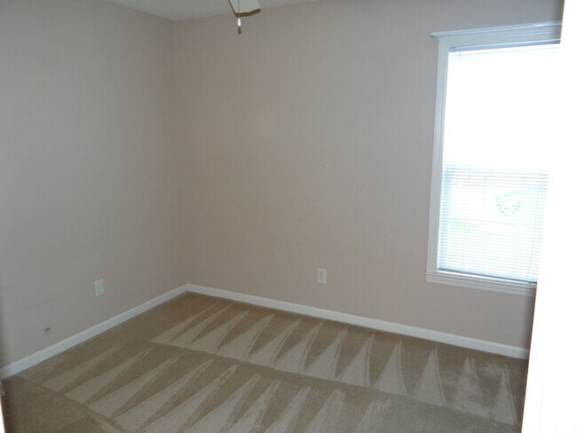 Building Photo - Lovely 3 bedroom 2 bath home in 55 and older neighborhood with 2 car garage