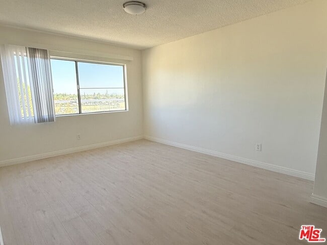 Building Photo - 10200 De Soto Ave