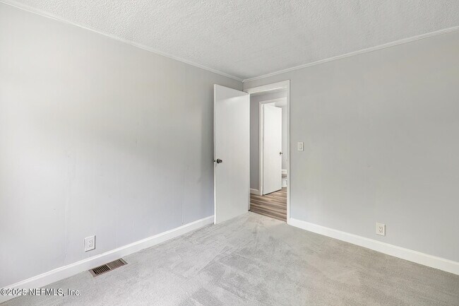 Building Photo - 1104 Harmony Dr N