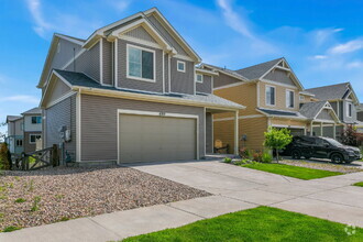 Building Photo - Spacious Banning Lewis Home with Finished ...