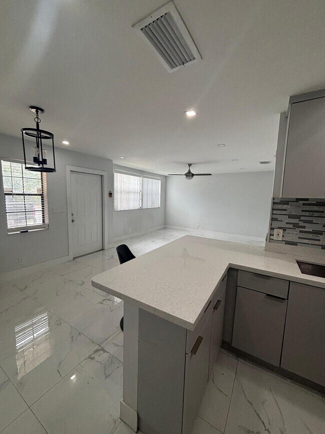 Building Photo - 2860 Coral Springs Dr