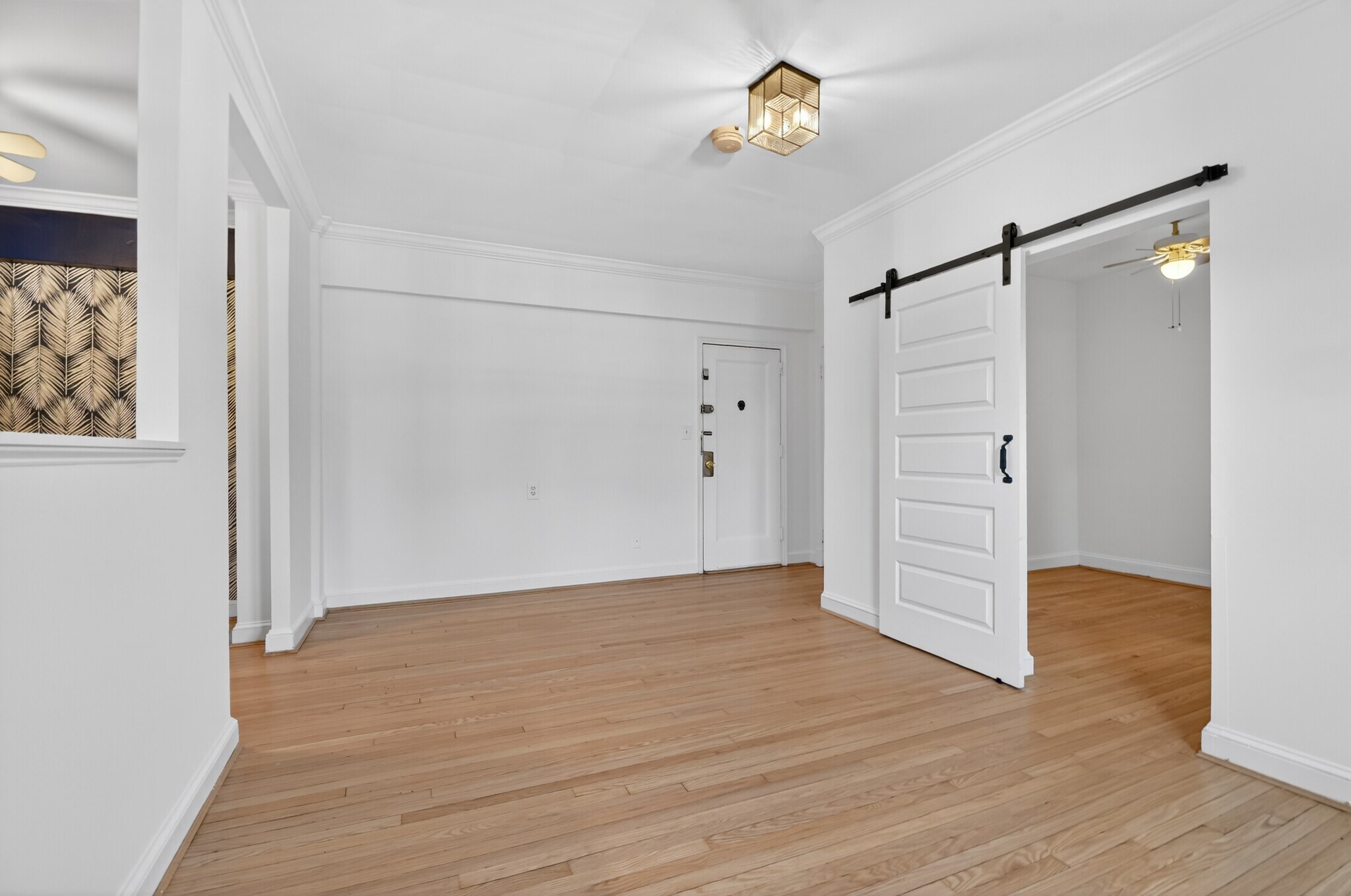 Living room opens to bedroom and kitchen - 3925 Davis Pl NW