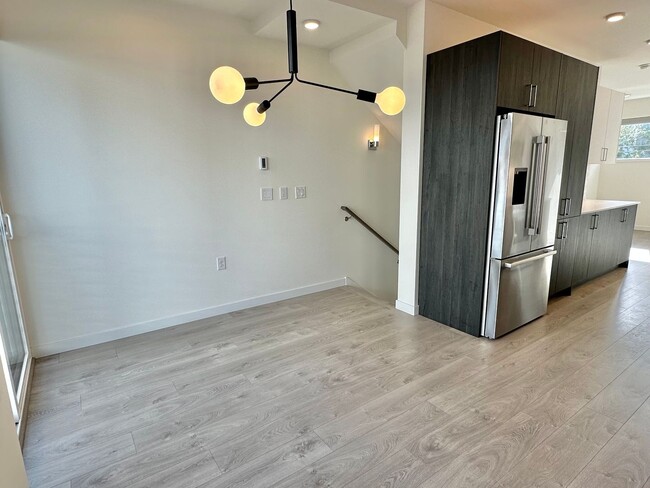 Building Photo - Modern home w/rooftop deck in desired Cher...