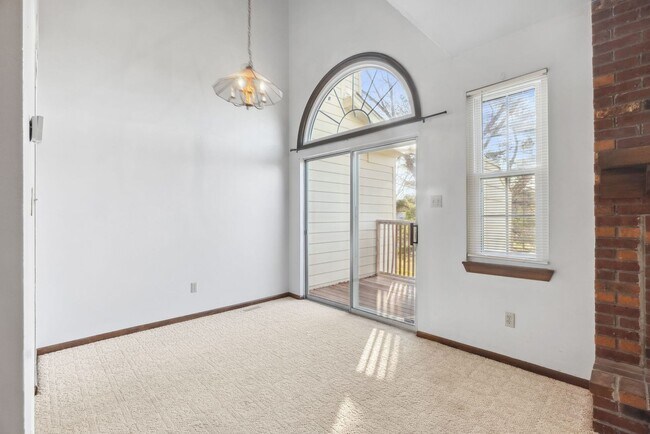 Building Photo - COMING SOON - Spacious 2-Bed, 3.5-Bath Townhouse with Stunning Lake Views