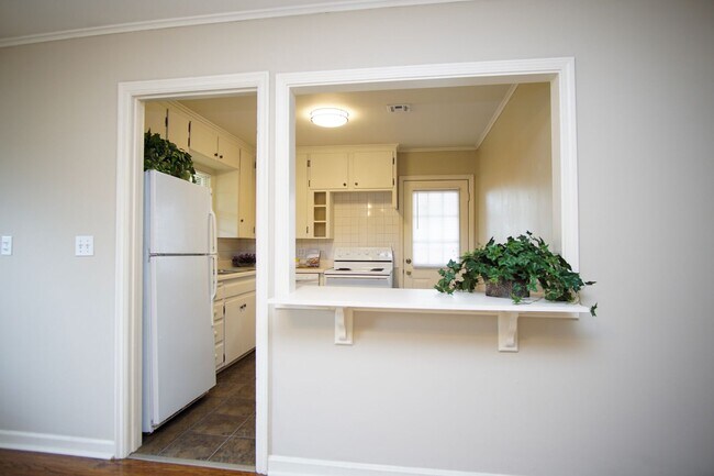 Building Photo - Gorgeous duplex unit on large lot with garage -- NO PETS ALLOWED