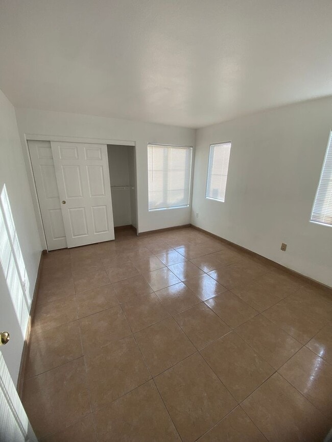 Building Photo - AMERICANA Property Mgmt - Downstairs 2 bed...