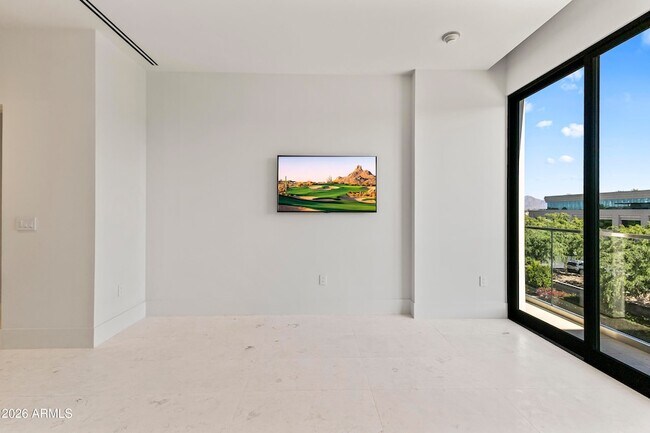 Building Photo - 6587 N Palmeraie Blvd