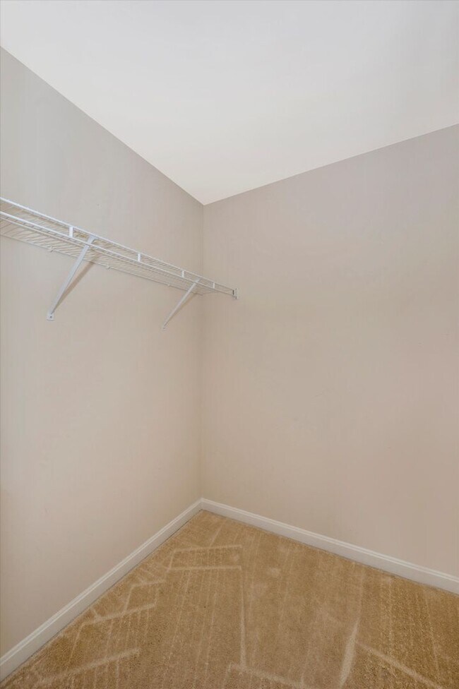 Building Photo - Desirable Two Level Condo For Lease - Not Pet Friendly