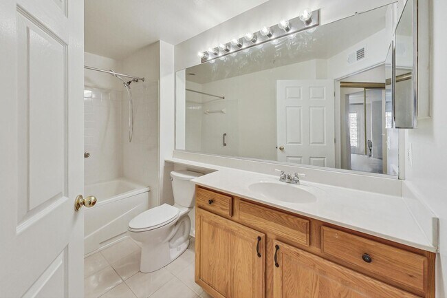 Building Photo - READY TO GO!!! Renovated 2BD/2BA with 1 Reserved Parking Space & screened in rear porch