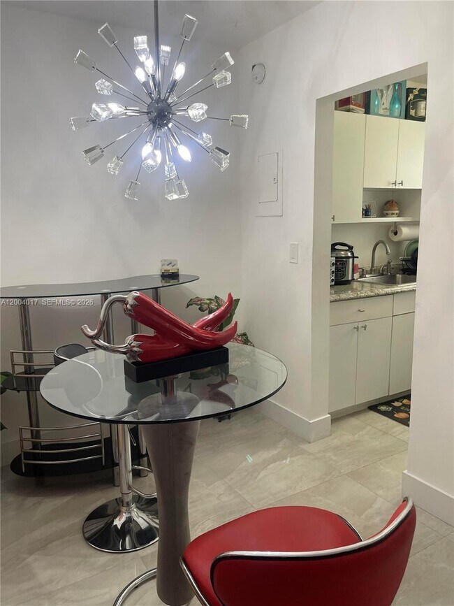 Building Photo - 1255 W 49th Pl