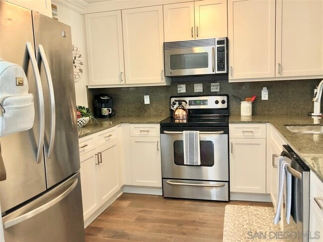 Building Photo - 7545 Charmant Dr