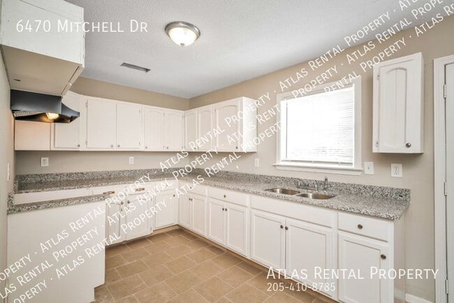 Building Photo - 6470 Mitchell Dr