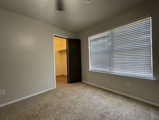 Building Photo - Spacious Snyder Home: 3 Beds, 2 Baths, 2-Car Garage & Cozy Carpeted Bedrooms!