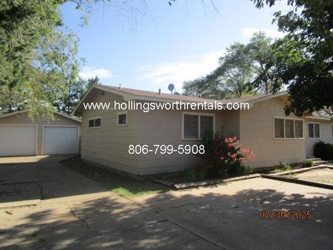 Building Photo - 4 bedroom, 2 bath, 2 car garage with shop ...