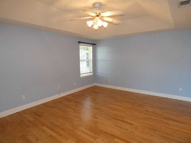 Building Photo - Charming 4-Bedroom Home With Sunroom