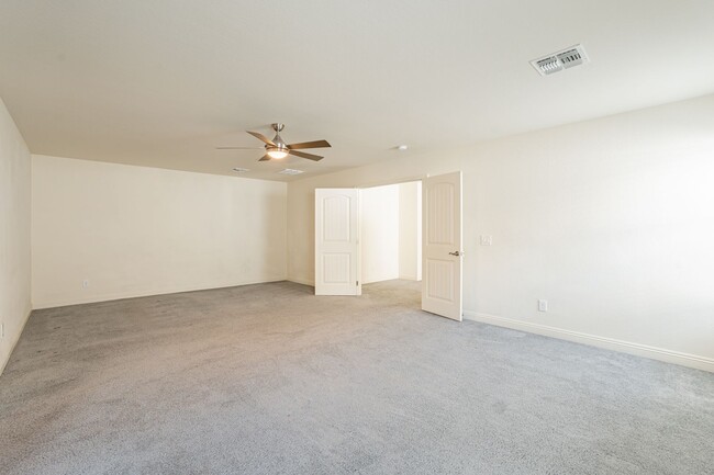 Building Photo - Verrado Living - 4 Bedrooms & 3 Baths!
