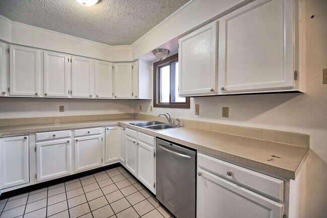 Building Photo - 4-Bedroom Home Near CSU | Fenced Yard & 2-Car Garage