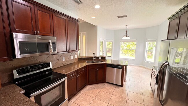 Building Photo - Available NOW! Stunning 4-Bedroom Home in ...