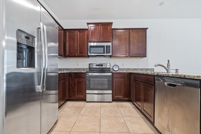 Building Photo - "Gated community in Seven Oak 3-Bedroom Townhouse with Granite Countertops in Wesley Chapel, FL"
