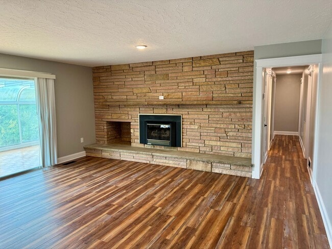 Building Photo - Exquisite Brick Ranch with Modern Upgrades, Countryside Charm And Two Car Garage