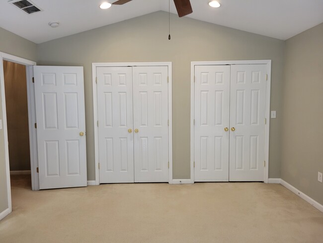 Dual closets in the primary bedroom - 205 Woodstone Dr