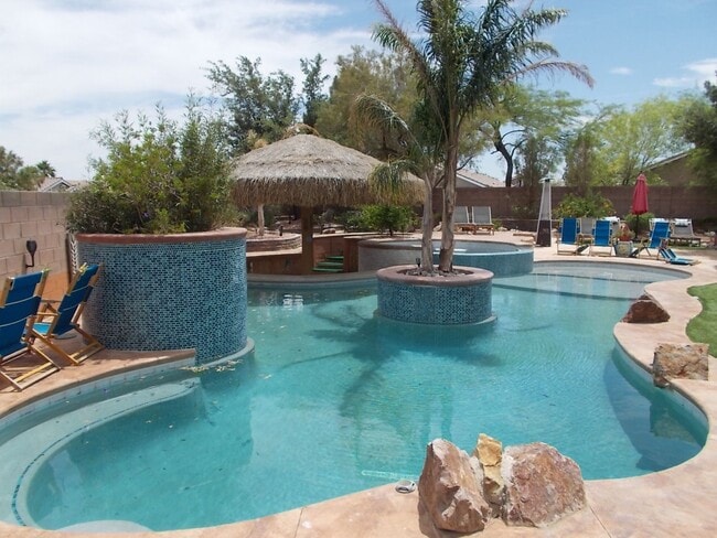 Building Photo - Stunning 4-Bedroom Ranch-Style Rental with Resort-Style Backyard!