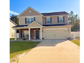 Building Photo - Spacious 5-bedroom, 3-bath home featuring two additional flex rooms!