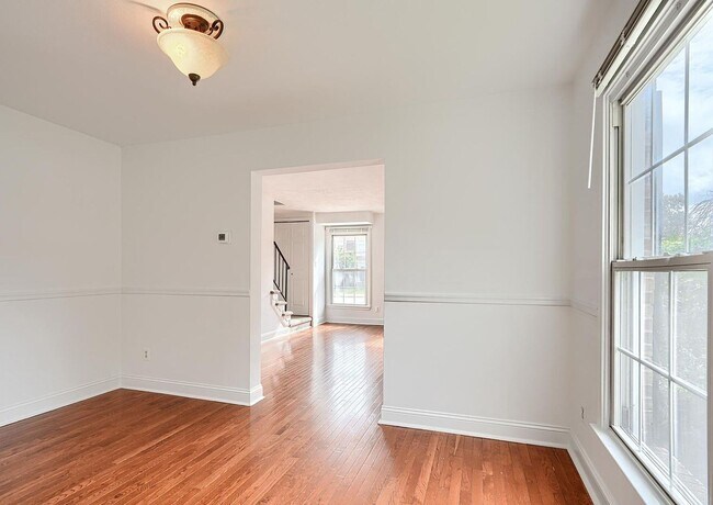 Building Photo - Updated End-of-Group Townhome with Finished Lower Level, Fenced Yard & Community Pool