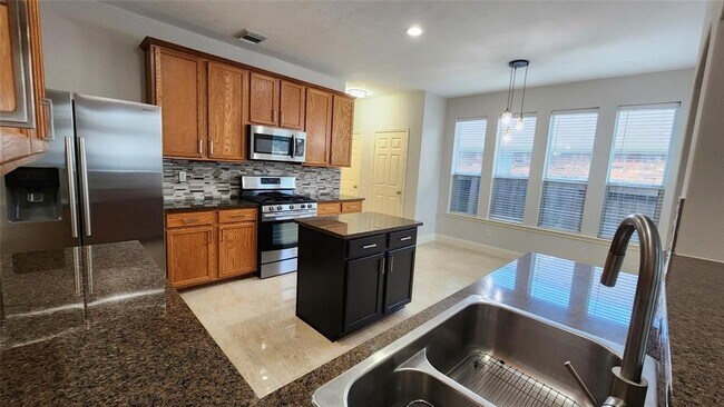 Building Photo - 24831 Red Bluff Tr