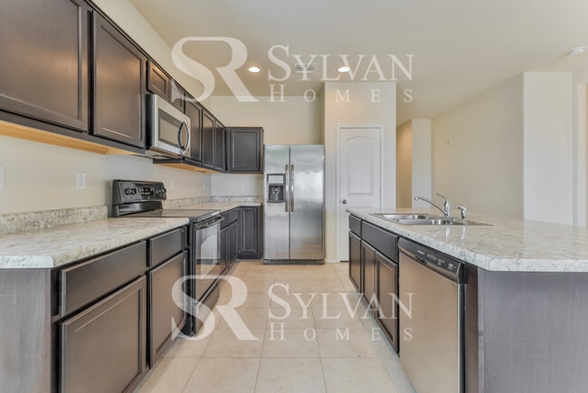 Building Photo - This charming home is ready for your personal touch!