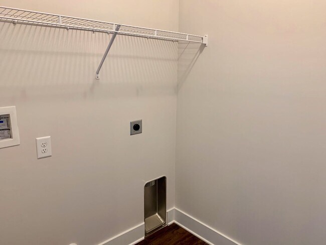 Building Photo - One level home with GARAGE and FENCED BACKYARD!