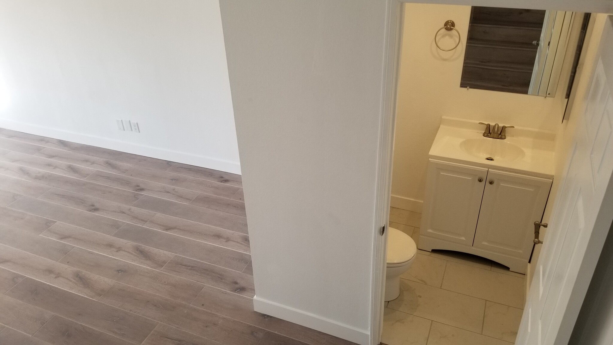 1/2 Bathroom, Front Door/Stairway View - 14126 Tiara St