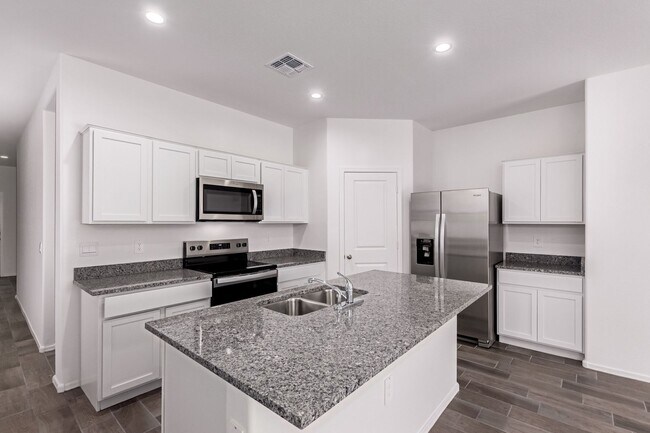 Building Photo - Brand New - Never Lived In 3 Bedroom / 2 B...