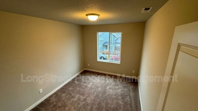 Building Photo - 5387 NW Torchcrest Pl