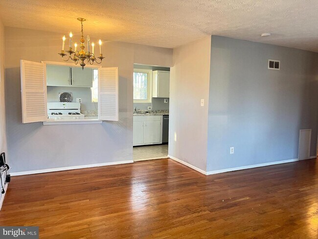 Building Photo - Discover the charm of this exquisite two-level home