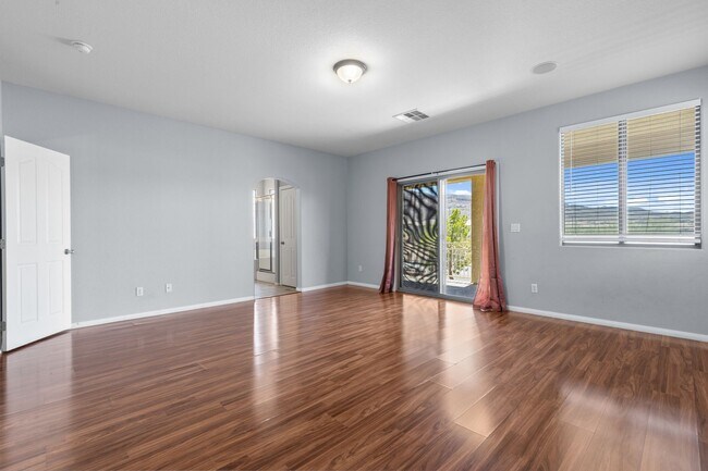 Building Photo - Beautiful 4BR Home in Gated Community with 3-Car Garage