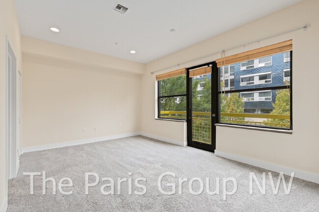 Building Photo - Exceptional 2 Story CapHill Condo * 2 Pkg Spaces, EV Charger & Rooftop Views
