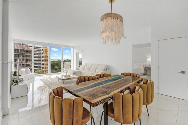 Building Photo - 10275 Collins Ave