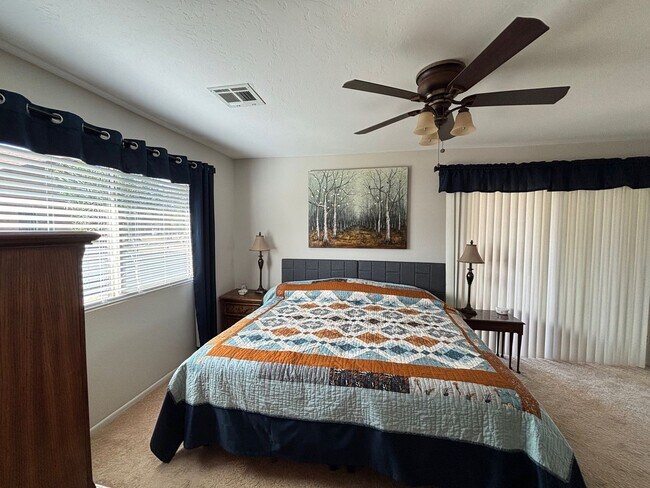 Building Photo - Welcome to this stunning updated 2-bedroom, 2-bathroom home on a lake located in the vibrant comm...