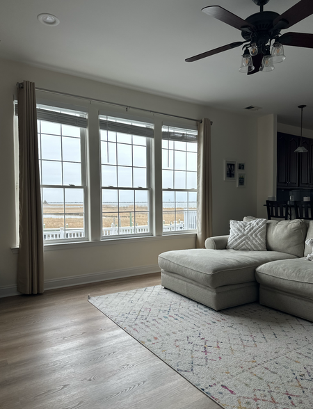 Living room with pool/bay views - 26 Bowsprit Dr