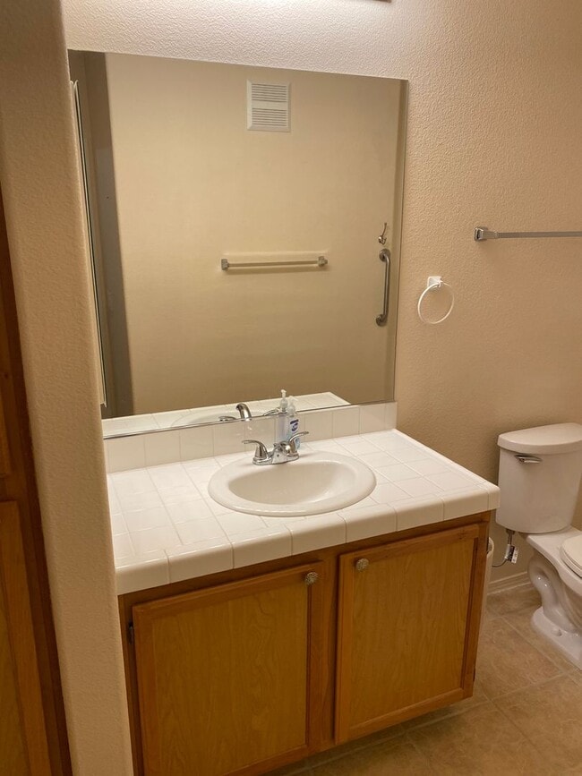 Building Photo - SE!!! Gated!! 2 Bedroom 1st Floor with Bal...