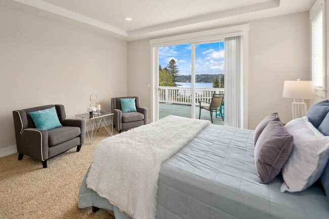 Building Photo - Water Views| Expansive Deck | Flexible Living Spaces