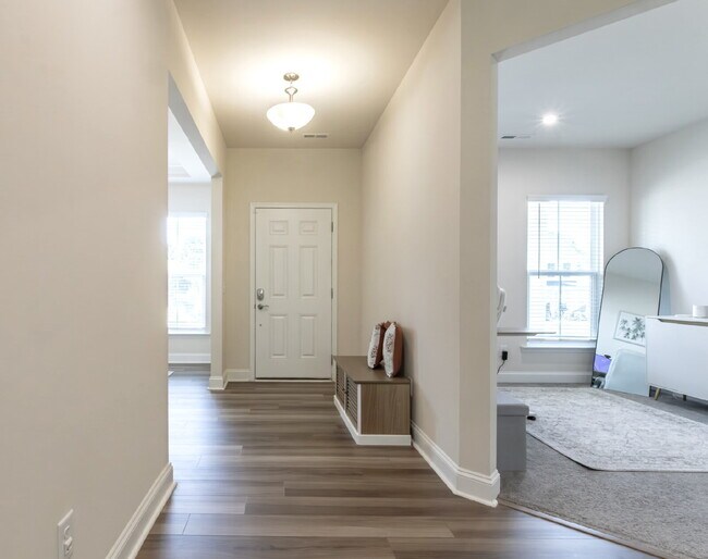 Building Photo - "Discover Spacious Living: 5-Bedroom Craftsman Home in Gated and Amenity-Rich Bretagne with Top-R...