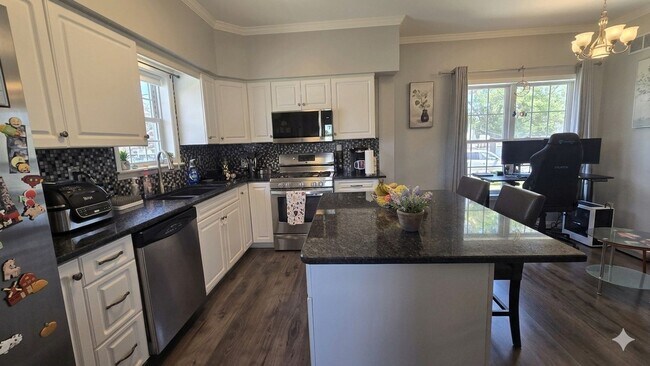Building Photo - Welcome to this 3 bedroom 3 Bull Bathroom home with a Basement