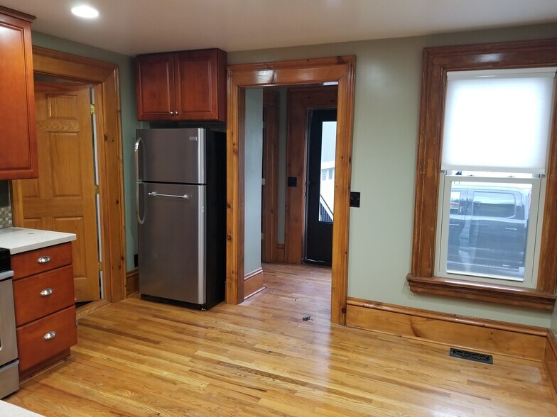 Kitchen leading to laundry room - 196 Bristol St